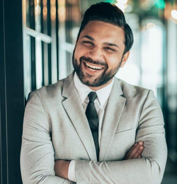 Business man crossing arms