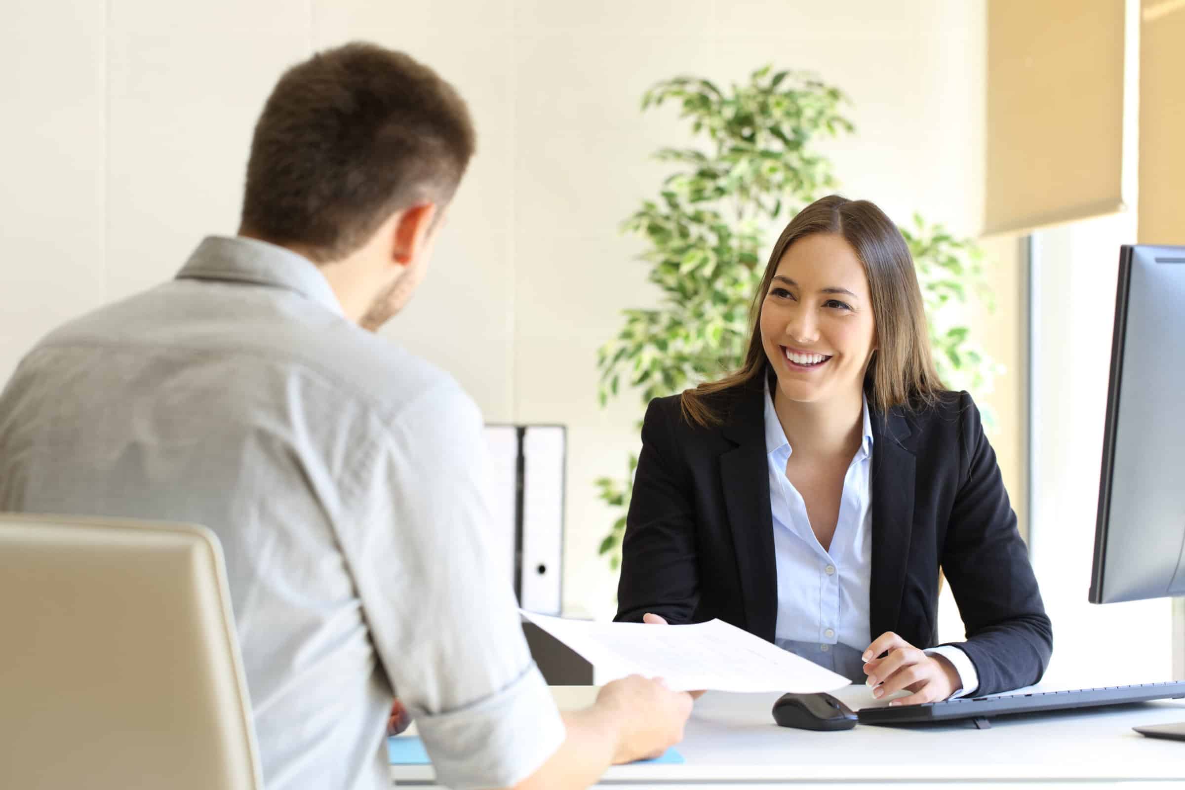 Man giving curriculum in a job interview